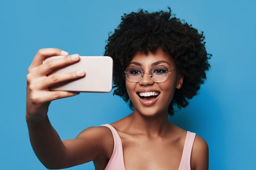 Woman Smiling Davoody & Hablinski Orthodontics in Houston, TX